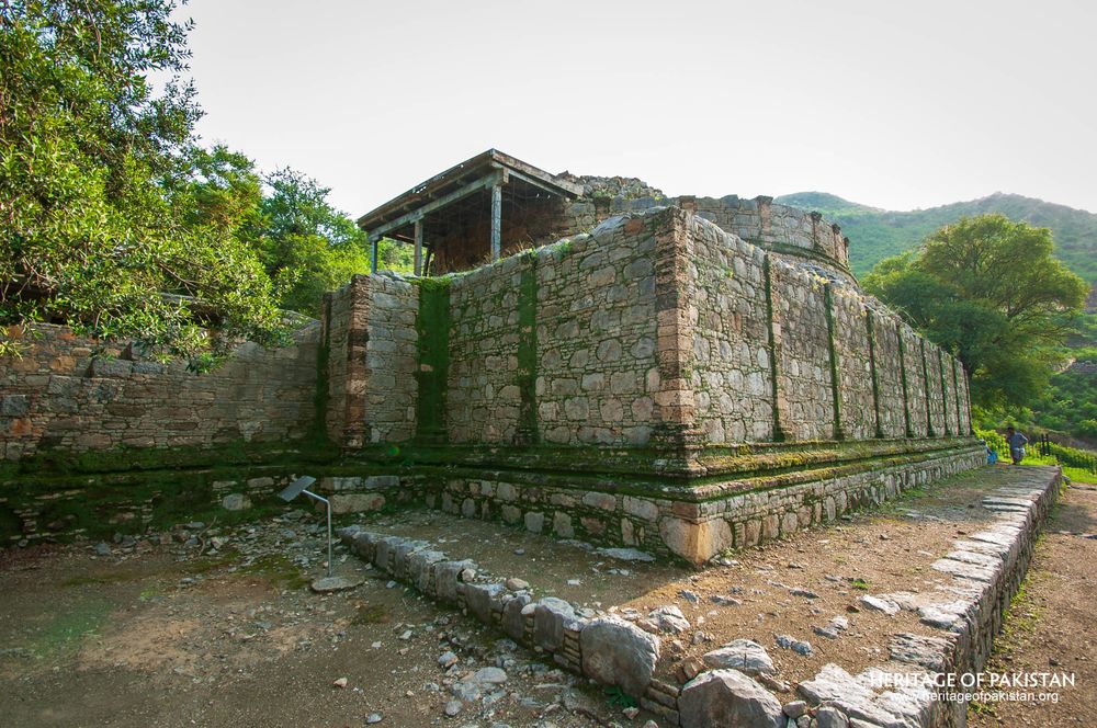 Protected chamber structure nestles within the natural landscape.